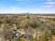 An aerial view of the neighborhood with the Atlanta skyline in the background on a sunny day at 121 Thirkield Se Ave, Atlanta, GA 30315