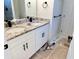 Bathroom featuring double sink vanity with a granite countertop, and modern fixtures at 121 Thirkield Se Ave, Atlanta, GA 30315