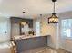 Modern kitchen showcasing a center island with granite countertops and stainless steel appliances at 121 Thirkield Se Ave, Atlanta, GA 30315