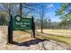 Sign for South Bend Park in Atlanta with a green lawn and baseball field in the background at 121 Thirkield Se Ave, Atlanta, GA 30315