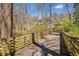 Scenic wooden boardwalk trail surrounded by lush trees and greenery at 121 Thirkield Se Ave, Atlanta, GA 30315