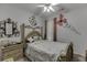 Bedroom with statement wall art and decorative bed at 1258 Rocky Branch Trl, Lawrenceville, GA 30043