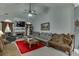 Cozy living room featuring a fireplace and comfortable seating at 1258 Rocky Branch Trl, Lawrenceville, GA 30043