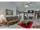 Cozy living room featuring a fireplace and comfortable seating at 1258 Rocky Branch Trl, Lawrenceville, GA 30043