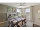 Bright bedroom with two windows, contemporary decor, and soft carpeting at 4277 Azalea Ridge Way, Hoschton, GA 30548