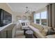 Inviting living room with comfortable seating, modern decor, and plenty of natural light at 4277 Azalea Ridge Way, Hoschton, GA 30548