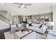 Spacious living room with hardwood floors, open layout, and stylish decor for a modern feel at 4277 Azalea Ridge Way, Hoschton, GA 30548