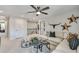 Upstairs loft area with neutral decor, comfortable seating, and a ceiling fan at 4277 Azalea Ridge Way, Hoschton, GA 30548