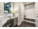 Inviting mudroom with built-in bench, storage, and convenient access to the home's interior at 4277 Azalea Ridge Way, Hoschton, GA 30548