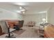 Finished basement with a desk, seating, and soft lighting—ideal for a home office or den at 1384 Sheffield Glen Ne Way, Atlanta, GA 30329