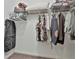 Spacious walk-in closet with ample hanging space and shelving for optimal storage and organization at 1384 Sheffield Glen Ne Way, Atlanta, GA 30329
