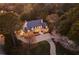 Stunning aerial view of a luxurious home with meticulously landscaped grounds and a long driveway at 3364 Knollwood Nw Dr, Atlanta, GA 30305