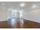 Large bonus room with hardwood floors, recessed lighting, and white trim at 3364 Knollwood Nw Dr, Atlanta, GA 30305