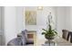 Refined dining room featuring stylish chairs, a glass-top table, and modern decor at 3364 Knollwood Nw Dr, Atlanta, GA 30305