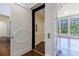 View of an open elevator, revealing a glimpse inside, situated near a well-lit room at 3364 Knollwood Nw Dr, Atlanta, GA 30305