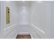 Interior of the elevator with wood floors, white walls, and a classic control panel at 3364 Knollwood Nw Dr, Atlanta, GA 30305