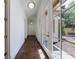 Hallway with hardwood floors and glass doors at 3364 Knollwood Nw Dr, Atlanta, GA 30305