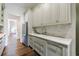 Stylish kitchen features stainless steel appliances, elegant cabinets, and marble countertops, perfect for cooking and entertaining at 3364 Knollwood Nw Dr, Atlanta, GA 30305