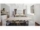 Sunlit kitchen and breakfast nook with stylish seating and modern design at 3364 Knollwood Nw Dr, Atlanta, GA 30305