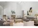 Bright living room featuring a fireplace and stylish contemporary furnishings at 3364 Knollwood Nw Dr, Atlanta, GA 30305