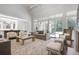 Elegant living room showcasing stylish decor and an open layout to kitchen at 3364 Knollwood Nw Dr, Atlanta, GA 30305