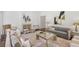 Open-concept living room with high ceilings and connection to the kitchen at 3364 Knollwood Nw Dr, Atlanta, GA 30305