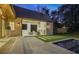 Stylish outdoor patio featuring a cozy seating area with an outdoor fireplace, set beside a modern pool at 3364 Knollwood Nw Dr, Atlanta, GA 30305