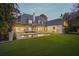Inviting backyard pool and patio area with an expansive lawn and seamless indoor-outdoor living at 3364 Knollwood Nw Dr, Atlanta, GA 30305