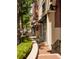 Charming streetscape with storefronts, awnings, and lush greenery creating a vibrant shopping experience at 655 Summit Hill Way, Cumming, GA 30040