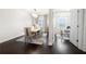 Dining room showcases modern lighting and flows into a bright office space at 82 Rising Fawn Ln, Marietta, GA 30060