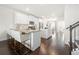 Contemporary kitchen with white cabinetry, stainless steel appliances, and breakfast bar seating at 82 Rising Fawn Ln, Marietta, GA 30060