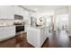 Stylish kitchen features white cabinets, stainless appliances, and granite counters at 82 Rising Fawn Ln, Marietta, GA 30060