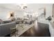 Open-concept living room flows seamlessly into the kitchen, creating a perfect space for entertaining at 82 Rising Fawn Ln, Marietta, GA 30060