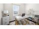 Stylish home office with modern desk, shelving, and ample natural light for a productive workspace at 82 Rising Fawn Ln, Marietta, GA 30060