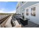 Relaxing outdoor patio with comfortable seating, stylish cushions, and scenic view at 82 Rising Fawn Ln, Marietta, GA 30060