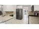 Updated kitchen features granite countertops and stainless steel appliances at 1603 Pinder Point Dr, Lawrenceville, GA 30043