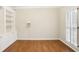 Office with hardwood floors, built-in shelving, and natural light at 1603 Pinder Point Dr, Lawrenceville, GA 30043