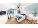 Cozy bedroom with a plush bed, and a cute teddy bear, creating a whimsical space at 7492 Shadburn Ferry Rd, Cumming, GA 30041