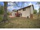 Large fenced backyard with a spacious deck, perfect for outdoor entertaining and relaxation at 1517 Cherry Hill Sw Rd, Conyers, GA 30094
