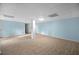 Spacious basement with neutral-colored walls and floors, and functional support beams at 1517 Cherry Hill Sw Rd, Conyers, GA 30094
