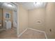 Unfinished basement bathroom area with essential fixtures and wood-look flooring at 1517 Cherry Hill Sw Rd, Conyers, GA 30094