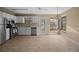 Eat-in kitchen featuring stainless steel appliances, neutral color cabinets, and a window seat at 1517 Cherry Hill Sw Rd, Conyers, GA 30094