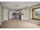 Eat-in kitchen featuring stainless steel appliances and white cabinets at 1517 Cherry Hill Sw Rd, Conyers, GA 30094