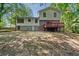 Expansive backyard featuring a well-maintained lawn at 235 Shallowford Nw Rd, Kennesaw, GA 30144