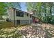 Expansive backyard featuring a well-maintained lawn at 235 Shallowford Nw Rd, Kennesaw, GA 30144