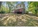 Expansive backyard featuring a well-maintained lawn at 235 Shallowford Nw Rd, Kennesaw, GA 30144