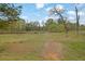 Large backyard and view of the natural surroundings at 3945 Hamilton Cove Ct, Cumming, GA 30028