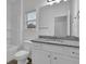 Bathroom featuring a bathtub with shower and a vanity with granite countertop at 3945 Hamilton Cove Ct, Cumming, GA 30028