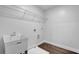 Laundry room featuring a sink and wire shelving at 3945 Hamilton Cove Ct, Cumming, GA 30028