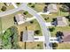 An aerial view of the property, showing the backyard, deck and how it sits within the neighborhood at 1606 Kenilworth Se Ln, Conyers, GA 30013
